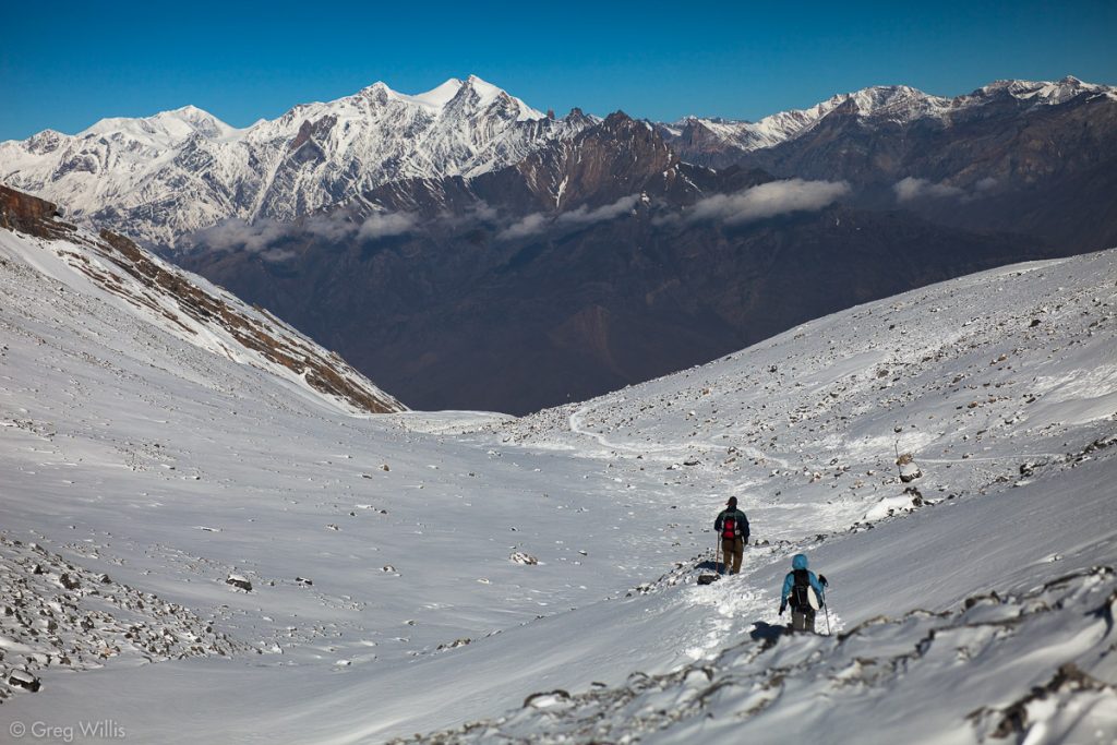 Beginning the descent to Muktinath in the fresh snow